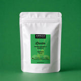 Envase doypack de infusión de Llantén antiinflamatorio y digestivo de Amman Tea Blends sobre fondo verde.