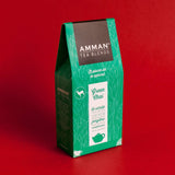 Caja de té verde chai Amman Tea Blends en envase verde con especias como canela, jengibre y cardamomo, infusión aromática y natural